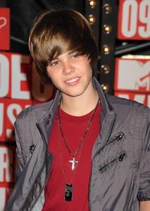 look @ this http://www.fanpop.com/spots/shadow-the-hedgehog/answers/show/123422/whos-hotter-shadow-justin-bieber