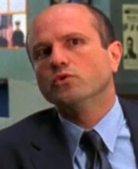 Joe Christie was a cop that worked with Monk around the time Trudy was killed. He was with Monk when he got the call about her death. He was kicked out of the police force because he was accused of stealing evidence. He is in Season three "Mr Monk and the employee of the month".
He was then working at a supermarket and there was a murder. Monk worked undercover to solve the case and found out that Joe didn't actually steal the evidence and he was reinstated. Heres a picture of him:

Hope this answers your question!!