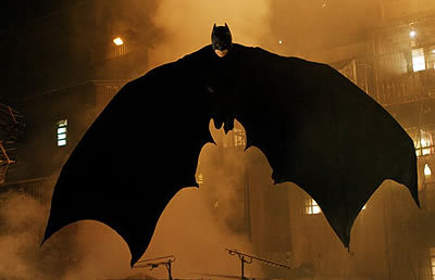  Batman wears a cape because: 1.He can use it to frighten criminals 2.It is a lot better to glide than to fall to the wall. 3.He can use it to cover himself from fire.