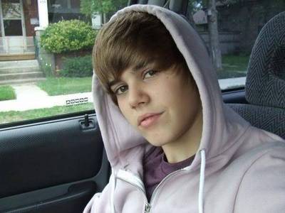  ..Justin Drew Bieber.. right after I answered that he came on t.v =)