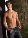  Taylor Lautner of course!!He is sooooo HOT!!Rob is just a scrawny little pale face with twigs for arms!! TEAM TAYLOR ALL THE WAY!! :)