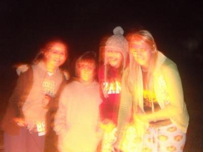  bonfire :D ! Amanda, Josh, Me, Briana none of us look the same :\ weird