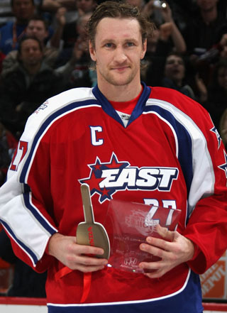  Mine is Alex Kovalev at the nhl all-star game when he won a trophy and a car for something like ''best player of the game''! I think he is one of the hottest hockey players ever!!! But that's just me...^^ (His blue eyes just kill me!!!) <333