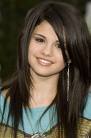  i hate her she can not sing she sounds like a pig and looks like one she makes me want to puke selena gomez rules