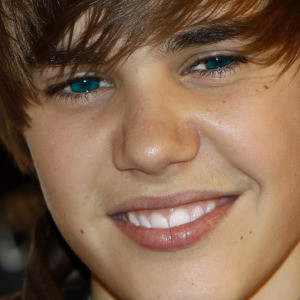  hell no justin bieber looks way better then plies looks like an old man. just look at justin dreamy eyes and goregoes hair