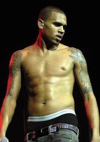 His friggen HOTT abs, they make my mouth water. And his voice is pretty darn cute. x) *YUMMY*