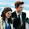  In Breaking Dawn does Charlie discover that bella is a vampire and so are the cullens?? im confused!!