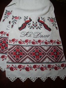  Hi, i'm from Ukrain so i think i can tell te something about wedding in slavic countries. For example Ukrainian wedding featured lots of folk music, singing, dancing, and visual art, with rituals. In the episode also te saw Rushnyk - is a Ukrainian embroidered towel. Rushnyks are used as decorations during traditional weddings, and often have pairs of birds embroidered on them, representing the wedding couple. All those traditions back to the pre-Christian era. But game when pairs are dancing with balloon is populare in our countries too and it's not very old... So i can admit it seemed true stuff, but there wern't lots of alcohol and fights)))))))))