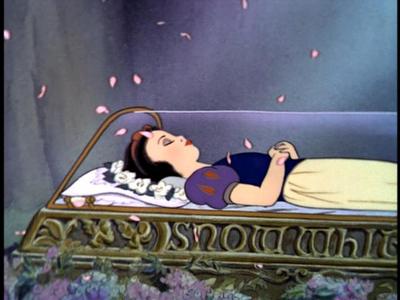 I think it would be for Snow White. The Dwarfs rush home and find her dead, and the music begins. Then they'd play the music up until the prince comes and kisses her (maybe they could add in a little montage of the dwarfs standing "eternal vigil", just to stretch the music a bit). When she wakes up it's silent, but then a bunch of happy music starts playing.

It sounded like a sad, mourning sort of song, so yeah.