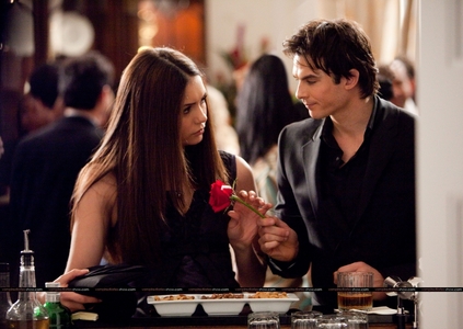 because they are meant you be togheter...damon is funny ,hot ,powerfull vampire exactly what elena needs...a vampire to make her want to live forever...to keep her entertained