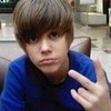 well, i like him in blue shirts! but red is great also! but i like any shirt he wears, whatever he wears hes still as hot as the sun! <3  I LOVE JUSTIN BIEBER!!!! <3
Peace!