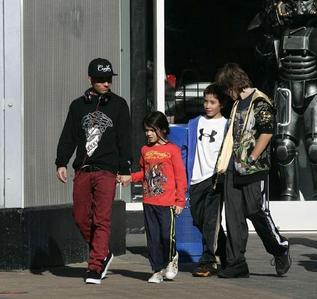  He is not MJ's son. I like him..no reason why I shouldn't :) I like it when they all go ..somewhere..and spend the time together