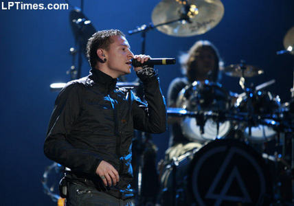  It's chazzy-chaz and he is the guy in the photo...yes anda guessed right chester bennington the coolest vocalist ever!