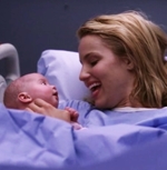I think it's better that she didn't so she can have a normal life now and it's probably best for the baby, too. I think that Rachel's mom is a good person and she really wanted a baby and will love her. I think it was the right choice for everyone :)