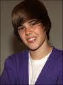Justin Bieber! have you seen his videos on youtube and justin actually talks to his fans nick is too shallow...justin loves his fans ALL OF THEM so yeah....VOTE JUSTIN :)