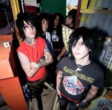  Ronnie Radke lead singer of Escape the fate (Hes in the front in the red