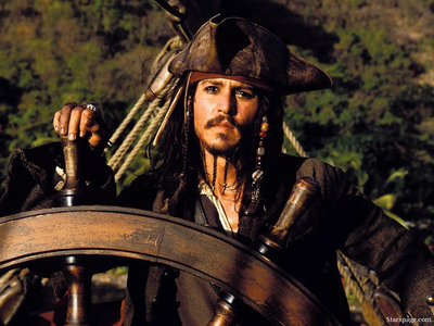 As far as animated films go, I simply can't pick! I'm obsessed with them all!!!  But as far as live action movies go, I am totally obsessed with the POTC movies! I love EVERYTHING about them...the scenery, costumes, characters...especially Captain Jack!!
