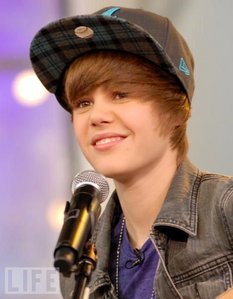 I am crazy for justin bieber... hes my role model, i dont want to act to crazy, but i love him so much... my number one wish would be for justin bieber to call me up on stage at his concert on july 8th in CO... it would make my life... and i would deffinetly give him a cookie!!! hahaha!