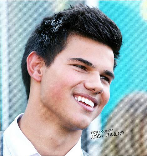 Kiss Taylor DUH!!! He is so funny and cute I mean LOOK AT HIM :) Team Taylor 4ever =D