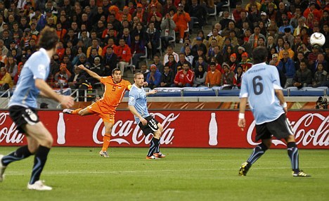 In my opinion, van Bronckhorst's goal against Uruguay.