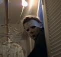  I had a dream that I was accueil alone and Michael Myers was standing outside my house. And every room that I went into he would be standing outside the window and watching me. I then went to lock the front door and he was standing at the door. I woke up before he was able to kill me.