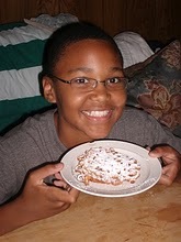  Well i didn't know if your supposed to put a pic of yourself or not so... this is me about to eat funnel cake. lol