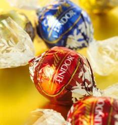  Lindt, their truffles are F-ing heaven.