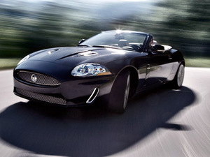  this is stellas car. its a jaguar color black roof open.