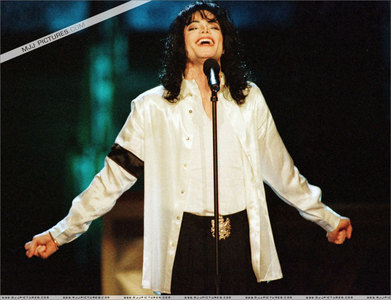 Here:MJ singing !