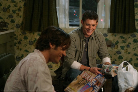 This one is fanflys answer Do u mean this one his celebrating with sam giving gifts
Dean and gabriel