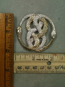 Here is a pic of the Auryn's they are about 1.5 ounces made of .925 silver.  plated with 14k gold.  I