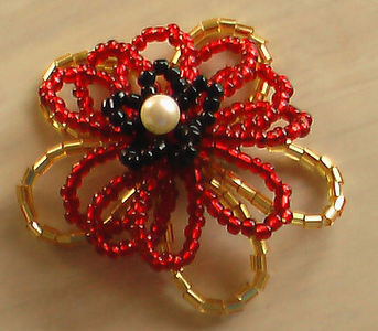  I’ve created a bead hoa tutorial that I’d like to share. Find it at: http://craftcove.blogsp
