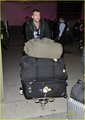 Sam arrives with Natalie Mark on LAX Airport (January 27) - sam-worthington photo