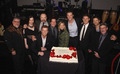 Cast and Crew at the 100th party with the cake - supernatural photo