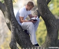 Kellan at the park with his dogs - twilight-series photo