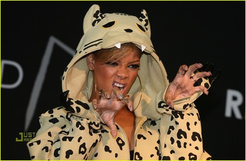  Rihanna Does 'The Claw' in Leopard Hoodie
