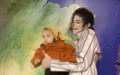 Michael kisses cute baby on cheek :) The most amanzing thing is to LOVE <3 :D - michael-jackson photo