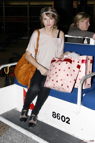  Taylor arriving at Sydney's Airport