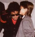 Pssst...There's something on your face - michael-jackson photo