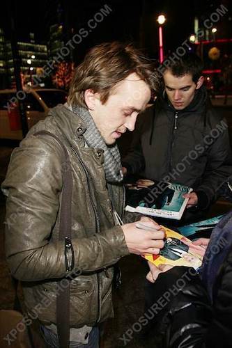  Signing autographs outside hotel in Berlin 2010