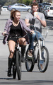 Miley Cyrus out bicycling with Liam Hemsworth (March 5) - celebrity-couples photo
