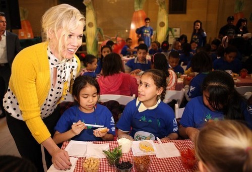  MARCH 11: Actress Jennie Garth interacts with New York City elementary school children