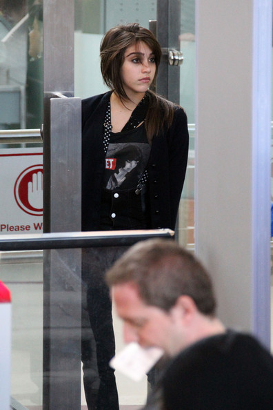 lourdes with rocco at the airport 3 8 10 Lourdes Ciccone Leon Photo