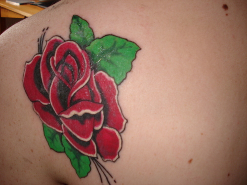  A big rose,my saat tattoo.