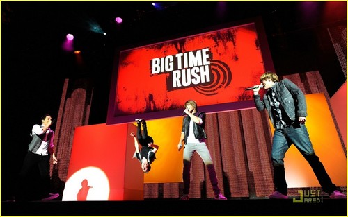 Kendall, Carlos, James singing and Logan mid-air flip