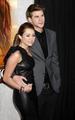 Miley Cyrus and Liam Hemsworth at the LA premiere of "The Last Song" (March 25) - celebrity-couples photo