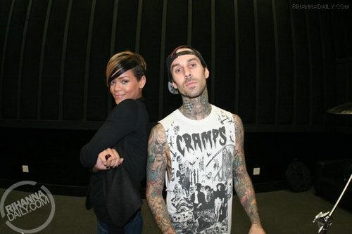 Travis Barker teaching Rihanna some things on drums - March 22, 2010