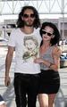 Katy Perry and Russell Brand at LAX Airport (March 28) - celebrity-couples photo
