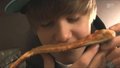 Justin smelling the pizza LOL xD  - justin-bieber photo