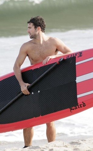 Brody surfing in Malibu